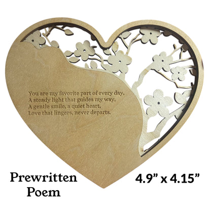 Valentine's four line poem on the back of wooden heart with cherry blossom cutouts. 4.9'' x 4.15''